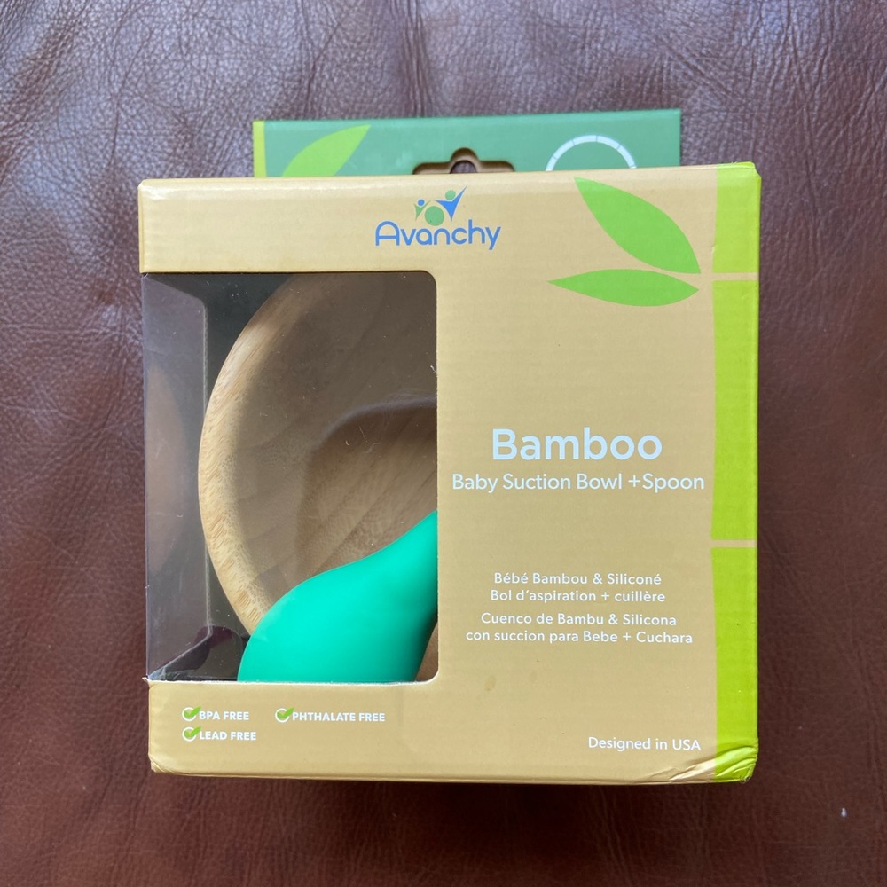 New in box. Avanchy Bamboo baby suction bowl & spoon